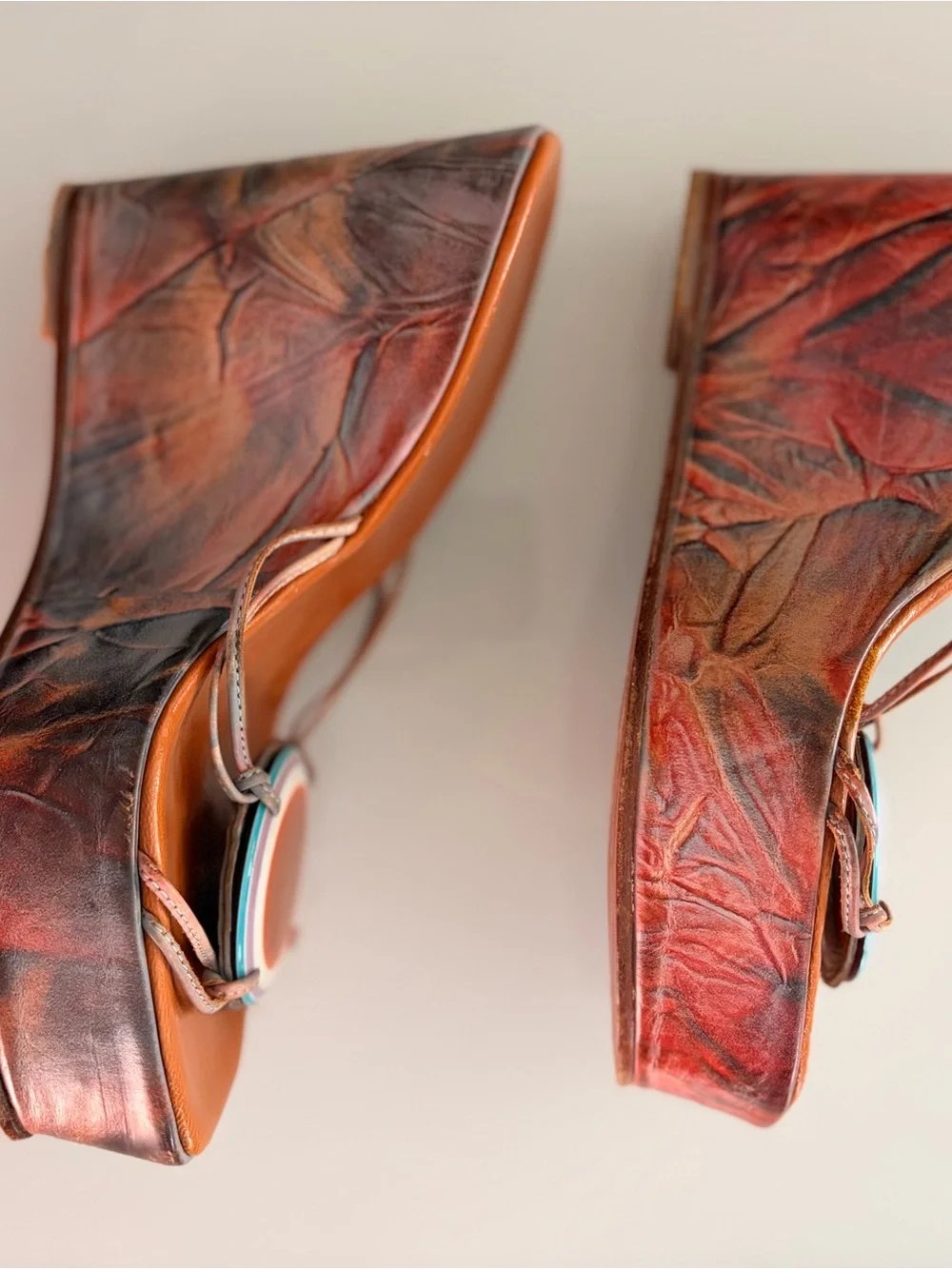Orange Leather Wedge Slides with Decorative Medallion